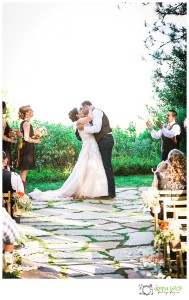 Forest House Lodge Wedding, Donna Beck Photography, Foresthill Wedding Photographer, hunting theme, orange and brown, wedding dress, cowboy boots, garter, first kiss
